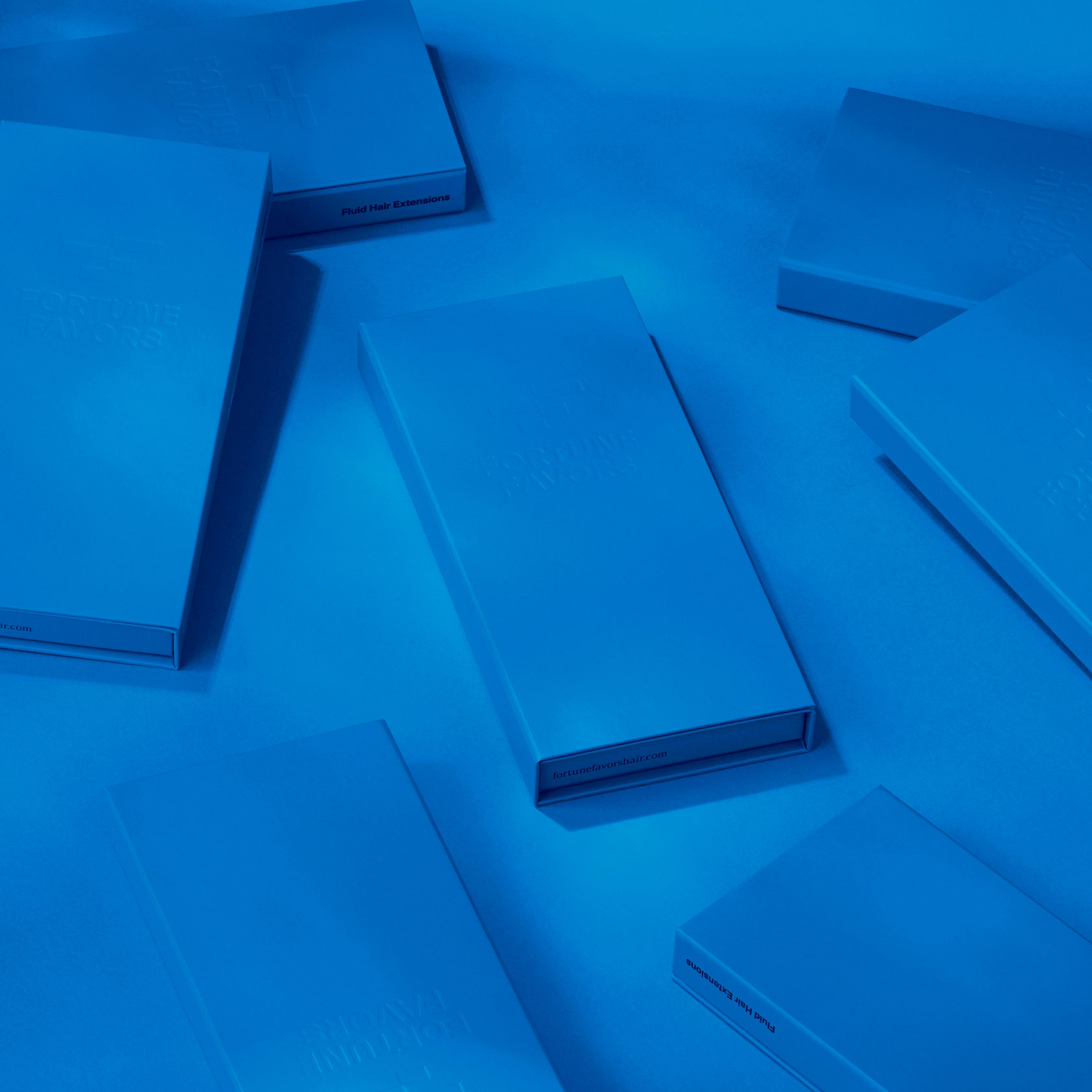 Blue product packaging on matching blue background
