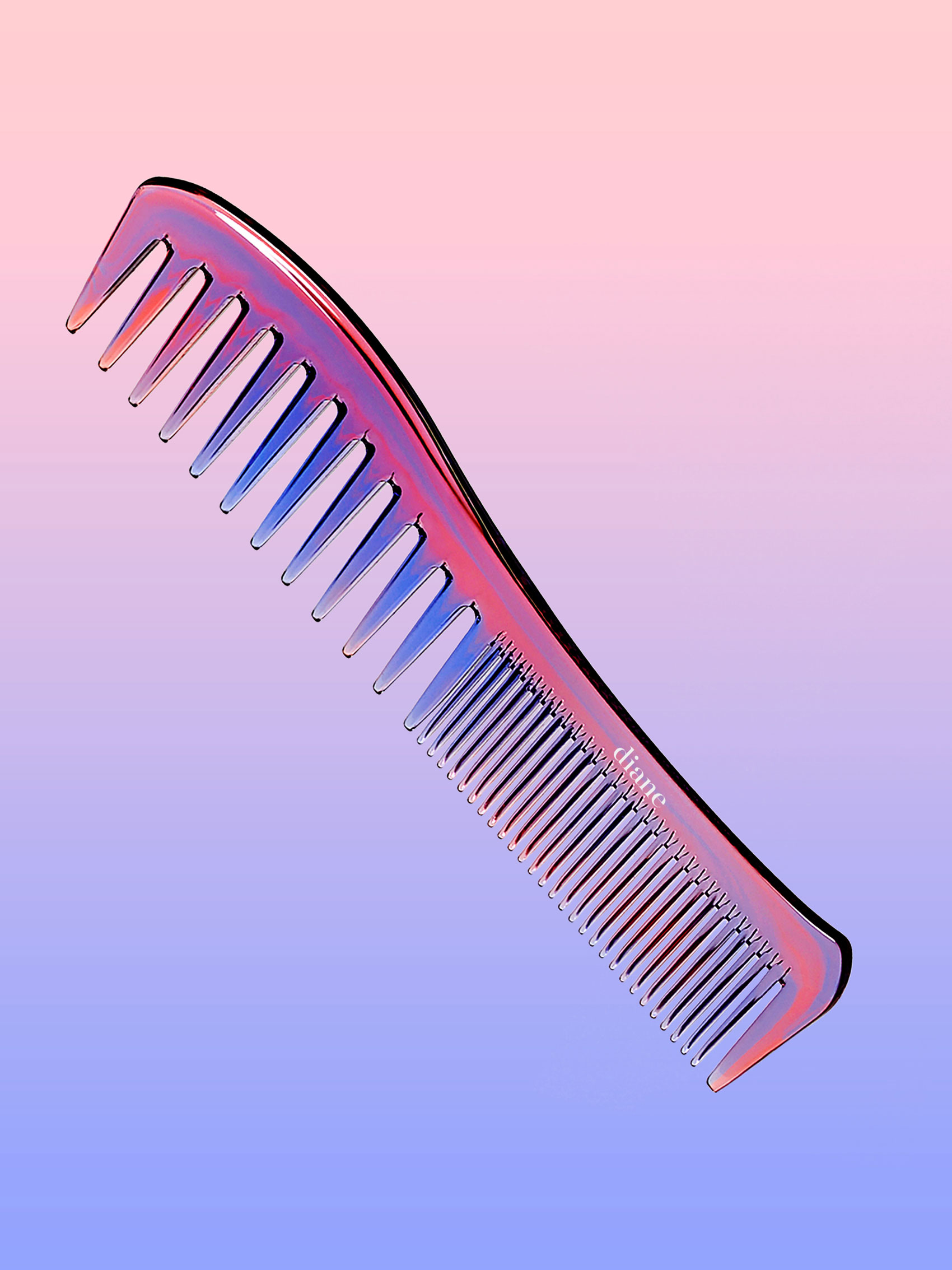 Comb suspended in air on pink and purple gradient